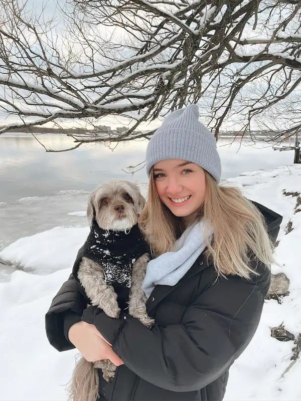 Abby enjoying time with her dog, showing the person behind the therapist role