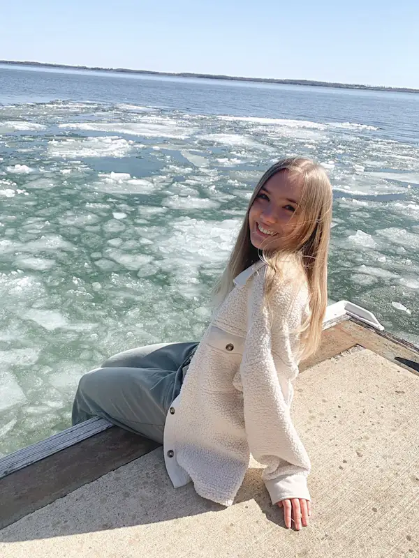 Abby on vacation, highlighting her warm and approachable personality outside the therapy room