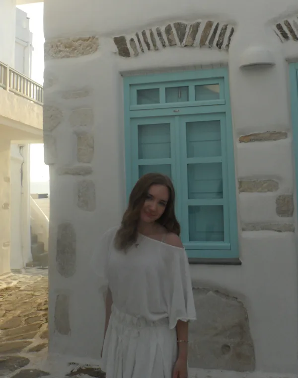 Abby enjoying a travel moment, showing the person behind the therapist role
